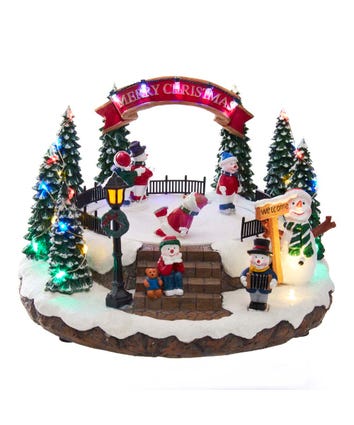 Battery-Operated LED Musical Snowman Ice Rink Table Piece